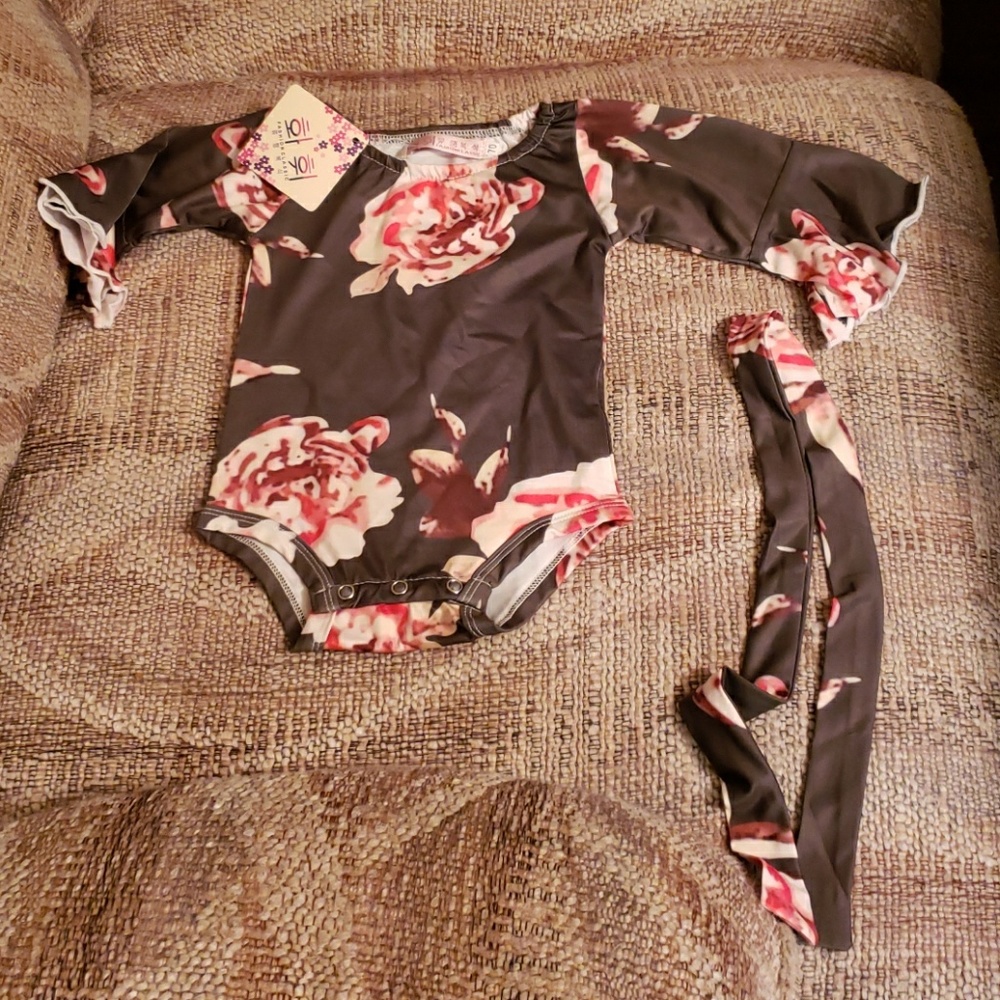 Stylish baby onesie and matching headband